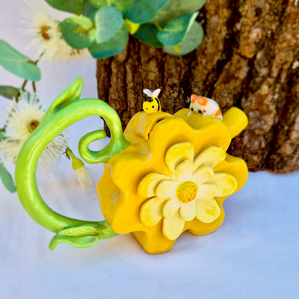 Yellow flower tea pot